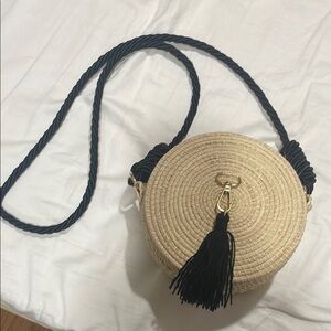 Round Straw Crossbody Bag with Black Tassel